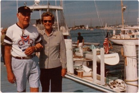C. Thomas Clagett, Jr. and Nancy Leiter Clagett walking on a dock in Newport, RI